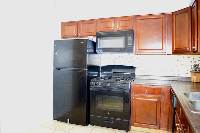 10241 Central Ave Unit 1B, Oak Lawn, IL 60453 - kitchen featuring black appliances, light tile patterned floors, backsplash, and brown cabinetry