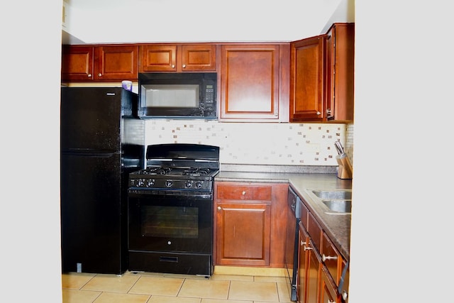 10241 Central Ave Unit 1B, Oak Lawn, IL 60453 - kitchen with black appliances, light tile patterned floors, backsplash, a sink, and dark countertops