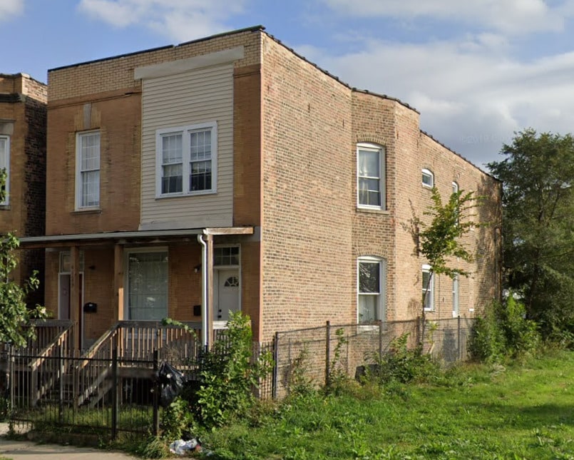 4129 W Jackson Blvd, Chicago, IL 60624 - view of property with brick siding and covered porch