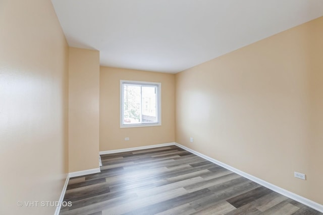 4037 Trafalgar Ln, Oak Lawn, IL 60453 - spare room featuring wood finished floors and baseboards