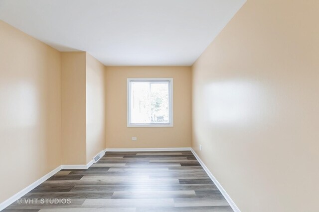 4037 Trafalgar Ln, Oak Lawn, IL 60453 - spare room with wood finished floors and baseboards