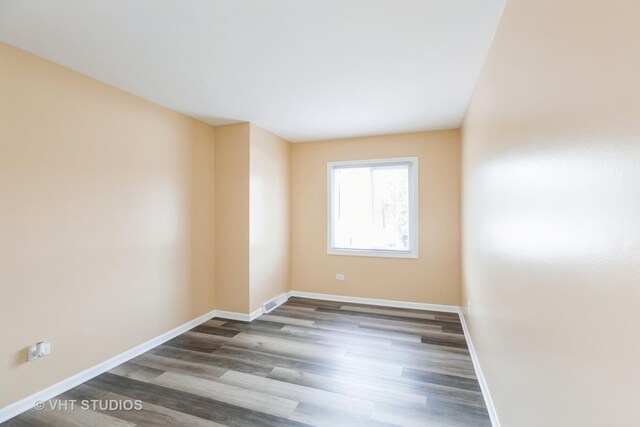 4037 Trafalgar Ln, Oak Lawn, IL 60453 - unfurnished room with baseboards and wood finished floors