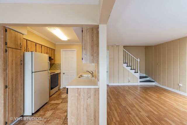4037 Trafalgar Ln, Oak Lawn, IL 60453 - kitchen featuring white appliances, a sink, light countertops, ornamental molding, and baseboards