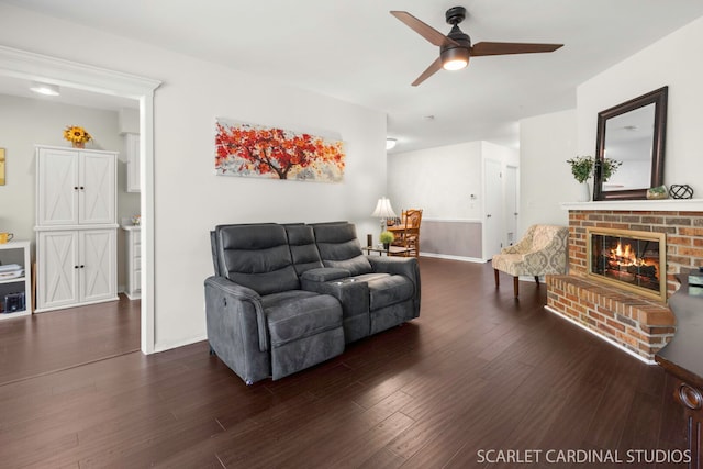 2S414 Emerald Green Dr Unit G, Warrenville, IL 60555 - living room featuring a ceiling fan, a fireplace, wood finished floors, and baseboards