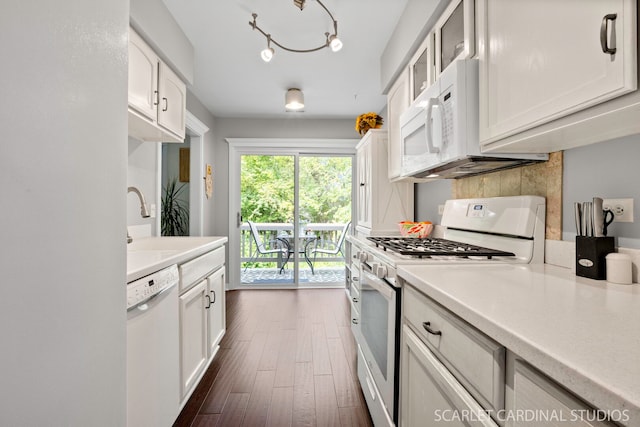2S414 Emerald Green Dr Unit G, Warrenville, IL 60555 - kitchen with white appliances, dark wood-style floors, light countertops, white cabinets, and glass insert cabinets