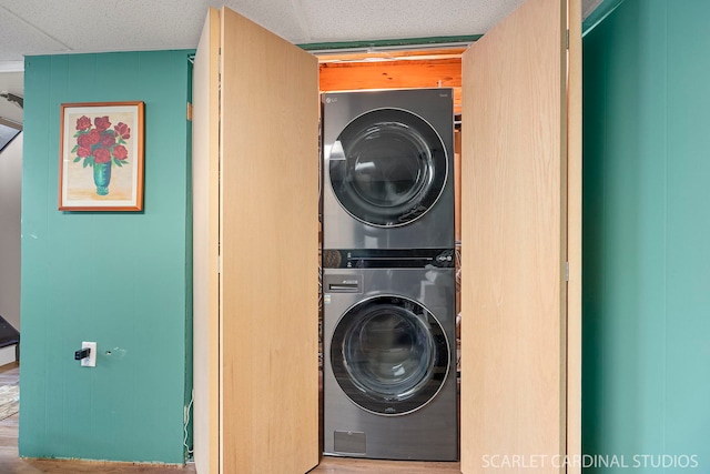 376 Belden Ave, Glendale Heights, IL 60139 - laundry area with stacked washer / drying machine and wood finished floors