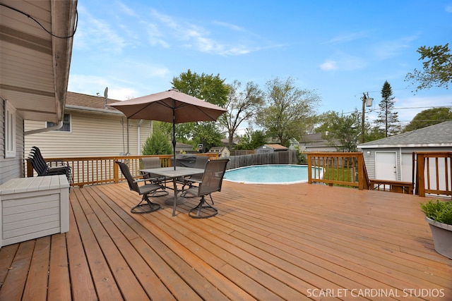 376 Belden Ave, Glendale Heights, IL 60139 - wooden deck featuring outdoor dining area and an outdoor structure