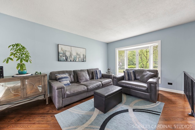 376 Belden Ave, Glendale Heights, IL 60139 - living room with wood finished floors, a textured ceiling, and baseboards