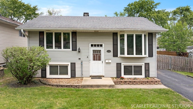 376 Belden Ave, Glendale Heights, IL 60139 - split foyer home with a chimney and roof with shingles
