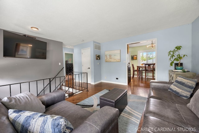 376 Belden Ave, Glendale Heights, IL 60139 - living area with wood finished floors, baseboards, and a chandelier