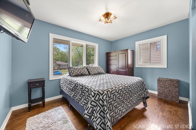 376 Belden Ave, Glendale Heights, IL 60139 - bedroom featuring baseboards and wood finished floors