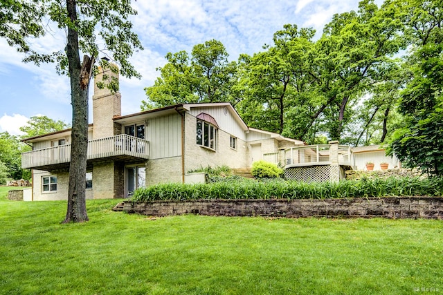 13443 S Forest Ln, Lockport, IL 60441 - view of front facade with a chimney, a wooden deck, a front yard, and brick siding