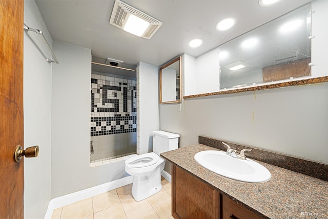 13443 S Forest Ln, Lockport, IL 60441 - bathroom featuring a tile shower, vanity, toilet, tile patterned floors, and baseboards