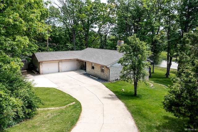 13443 S Forest Ln, Lockport, IL 60441 - view of front facade with an attached garage, driveway, a front lawn, a shingled roof, and stone siding