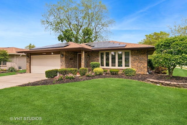 17124 Langley Ave, South Holland, IL 60473 - view of front facade with an attached garage, a front yard, concrete driveway, and brick siding