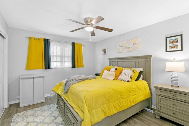 17124 Langley Ave, South Holland, IL 60473 - bedroom with wood finished floors, baseboards, and a ceiling fan