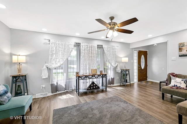 17124 Langley Ave, South Holland, IL 60473 - living room featuring a ceiling fan, wood finished floors, baseboards, and recessed lighting