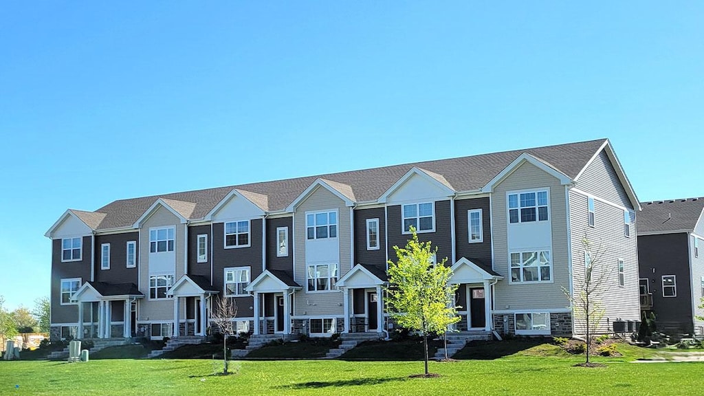 6550 Linden Trl Unit C, Wonder Lake, IL 60097 - view of property with a front yard and cooling unit