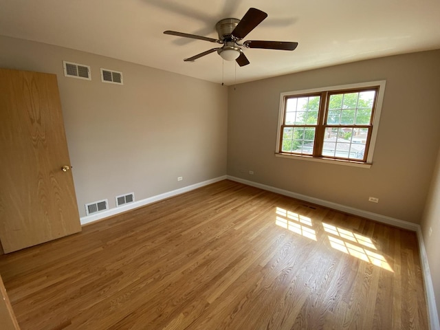 10724 S Ridgeway Ave, Chicago, IL 60655 - unfurnished room featuring baseboards, wood finished floors, and ceiling fan