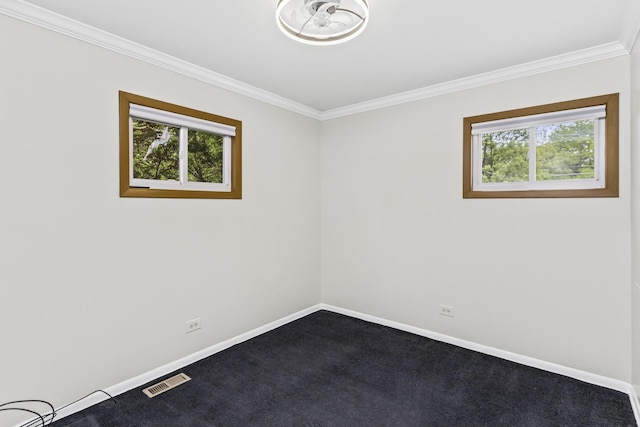 525 N 3rd Ave, Villa Park, IL 60181 - spare room with crown molding, baseboards, and dark colored carpet