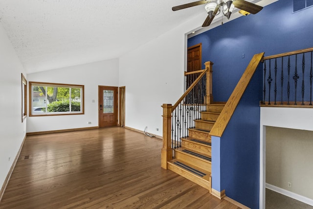 525 N 3rd Ave, Villa Park, IL 60181 - staircase featuring a ceiling fan, wood finished floors, baseboards, and high vaulted ceiling