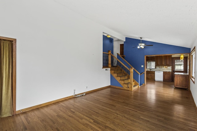 525 N 3rd Ave, Villa Park, IL 60181 - unfurnished living room featuring vaulted ceiling, dark wood-type flooring, stairway, a ceiling fan, and baseboards