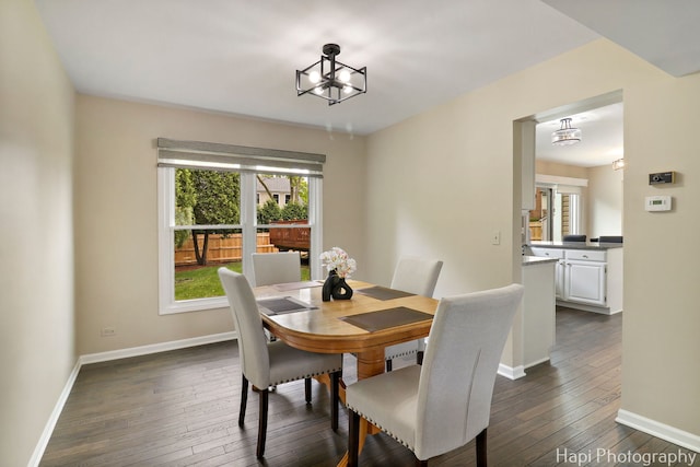 707 W Nichols Rd, Arlington Heights, IL 60004 - dining room featuring a chandelier, dark wood finished floors, and baseboards