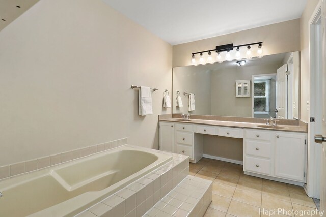 707 W Nichols Rd, Arlington Heights, IL 60004 - bathroom featuring double vanity, a bath, and tile patterned flooring