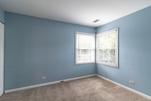 79 Willow Pkwy, Buffalo Grove, IL 60089 - spare room featuring carpet flooring and baseboards