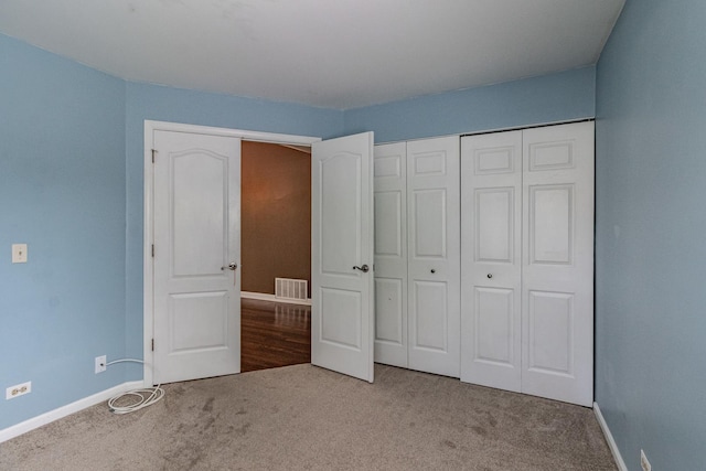 79 Willow Pkwy, Buffalo Grove, IL 60089 - unfurnished bedroom with carpet, baseboards, and a closet