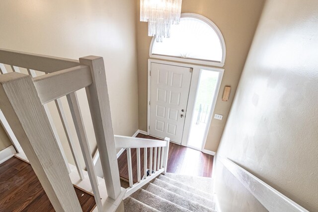 79 Willow Pkwy, Buffalo Grove, IL 60089 - entrance foyer with wood finished floors, a chandelier, and plenty of natural light