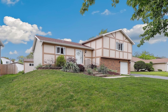 228 Oriole Rd, Matteson, IL 60443 - view of front facade with driveway, stucco siding, and a garage