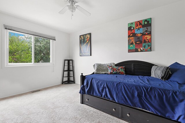 228 Oriole Rd, Matteson, IL 60443 - bedroom with carpet floors, baseboards, and ceiling fan
