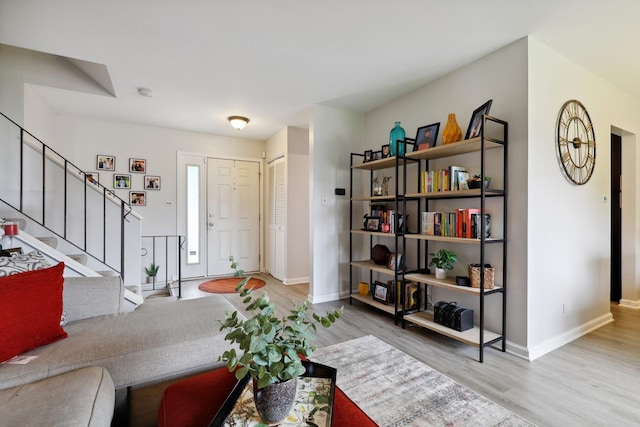 228 Oriole Rd, Matteson, IL 60443 - living area with wood finished floors, stairs, and baseboards