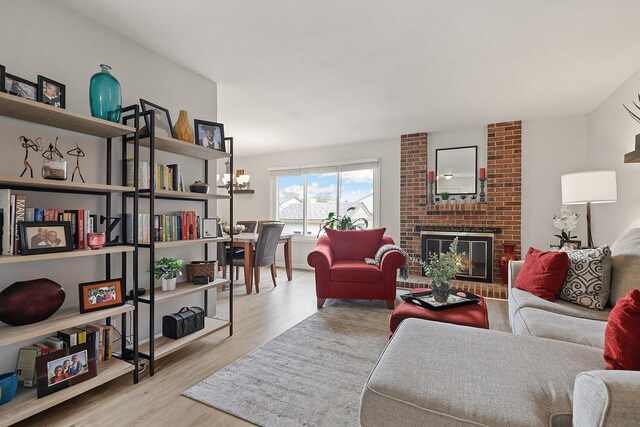 228 Oriole Rd, Matteson, IL 60443 - living room featuring wood finished floors and a fireplace