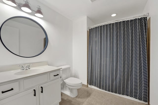 1110 W 15th St Unit 114, Chicago, IL 60608 - bathroom with vanity, toilet, tile patterned floors, and curtained shower
