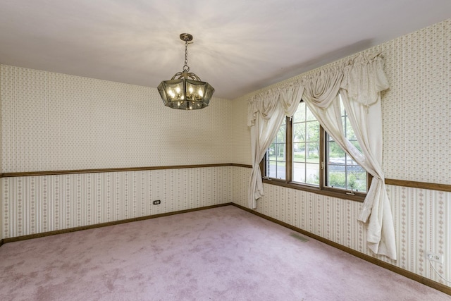12375 W Ash Ct, Beach Park, IL 60099 - spare room with a chandelier, wallpapered walls, and carpet floors