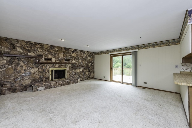 12375 W Ash Ct, Beach Park, IL 60099 - unfurnished living room with carpet flooring and a fireplace