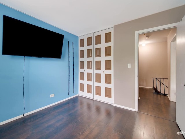 426 James Ct Unit C, Glendale Heights, IL 60139 - unfurnished bedroom with wood finished floors and baseboards