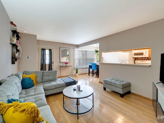 426 James Ct Unit C, Glendale Heights, IL 60139 - living room featuring wood finished floors and baseboards