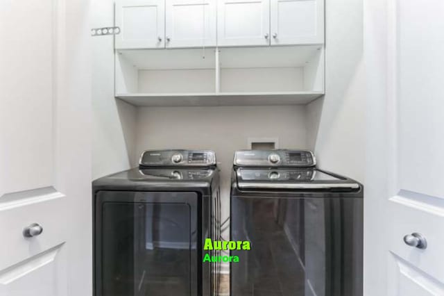 615 Camellia Ave, Aurora, IL 60505 - washroom featuring washing machine and clothes dryer and cabinet space