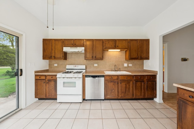 611 Kingsbridge Dr, Carol Stream, IL 60188 - kitchen featuring dishwasher, white gas range oven, under cabinet range hood, a sink, and light countertops