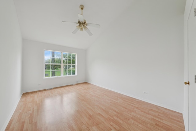 611 Kingsbridge Dr, Carol Stream, IL 60188 - spare room featuring light wood-type flooring, ceiling fan, baseboards, and vaulted ceiling