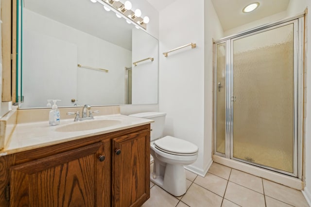 611 Kingsbridge Dr, Carol Stream, IL 60188 - full bath with tile patterned floors, vanity, a shower stall, and toilet