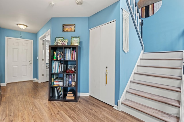 870 N Auburn Woods Dr, Palatine, IL 60067 - entryway with stairway, wood finished floors, and baseboards
