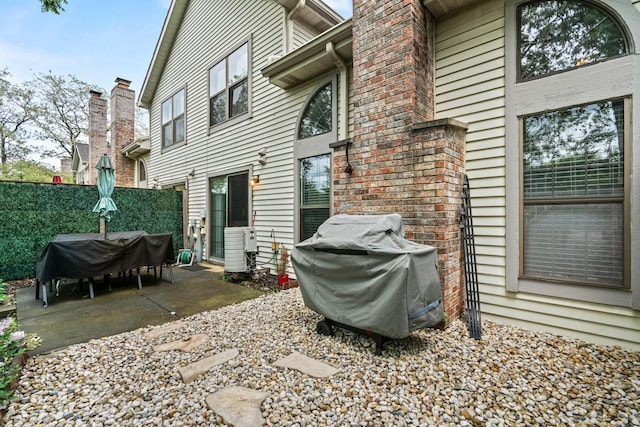 870 N Auburn Woods Dr, Palatine, IL 60067 - rear view of property featuring a patio