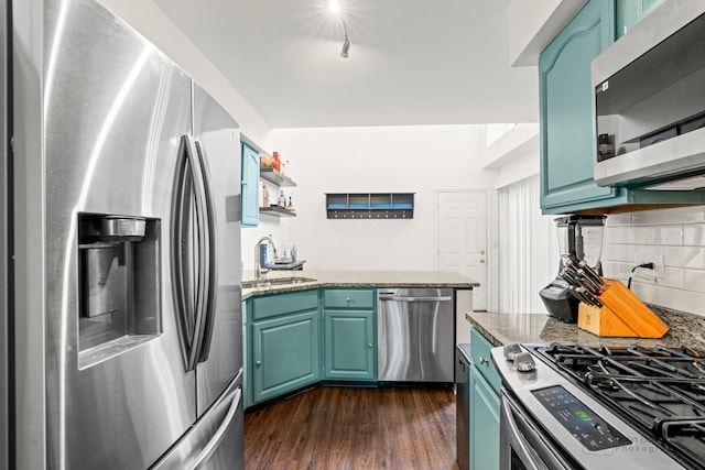 870 N Auburn Woods Dr, Palatine, IL 60067 - kitchen featuring appliances with stainless steel finishes, a sink, decorative backsplash, dark wood-style flooring, and a peninsula