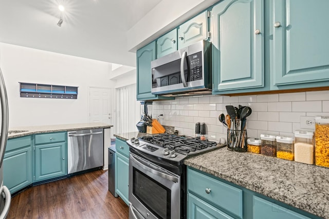 870 N Auburn Woods Dr, Palatine, IL 60067 - kitchen with stainless steel appliances, tasteful backsplash, dark wood-type flooring, and blue cabinets