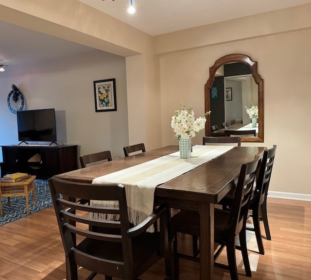 828 Graceland Ave Unit 404, Des Plaines, IL 60016 - dining space featuring wood finished floors and baseboards
