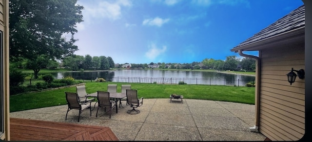 2903 Prairie Meadow Dr, Champaign, IL 61822 - view of patio featuring a water view and outdoor dining area